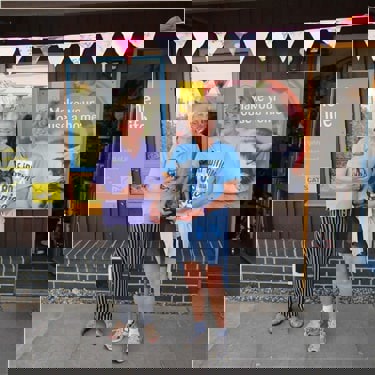 Two volunteers celebrating 45 years of dedication