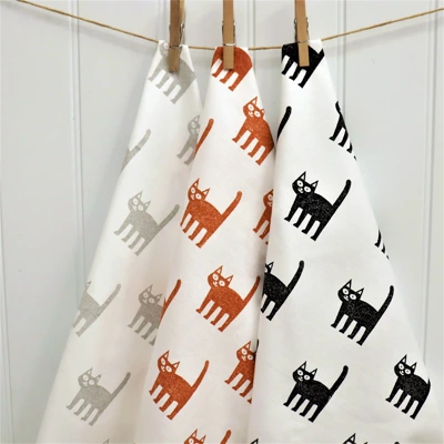 Block printed teatowels hanging up - brightened.jpg